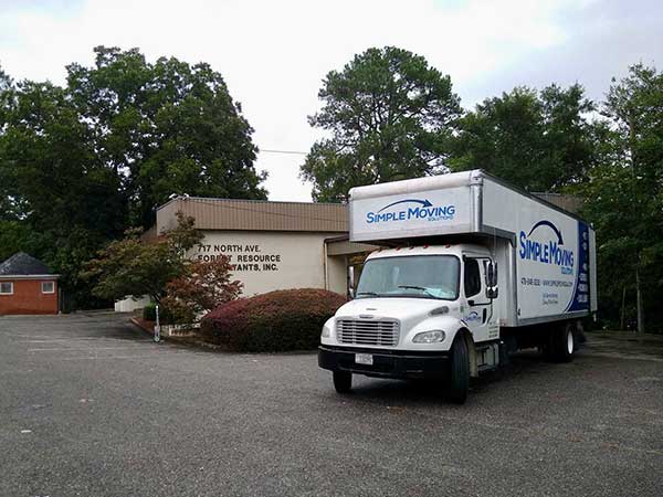 Moving truck with Simple Moving LLC logo for residential moving services.